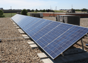 ballasted roof mounted solar panels on flat roof
