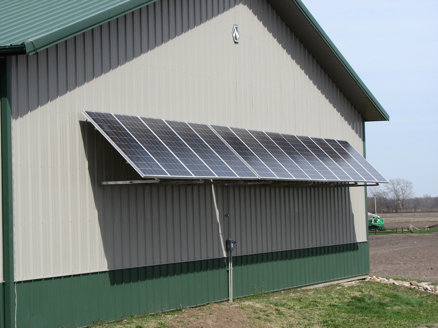 wall mounted solar panels on metal barn Tick Tock Energy