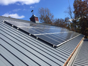 roof mounted solar panels on metal barn