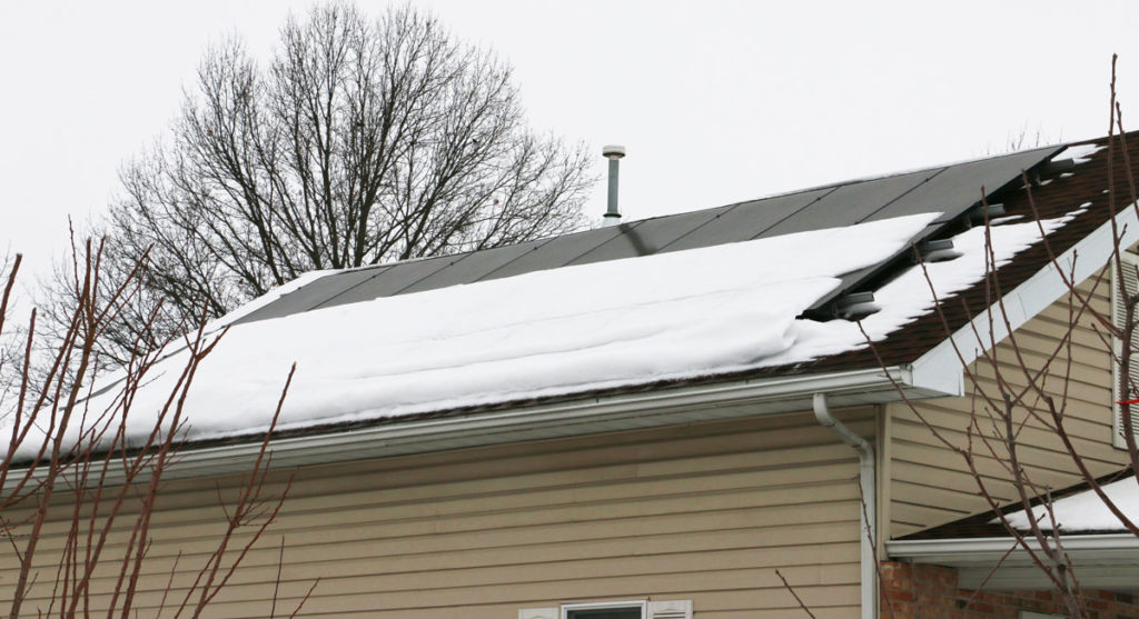 snow on solar panels