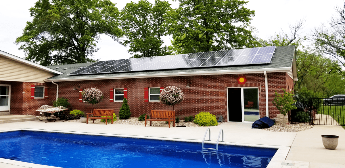 Residential roof mounted solar system near pool in Alton, IL