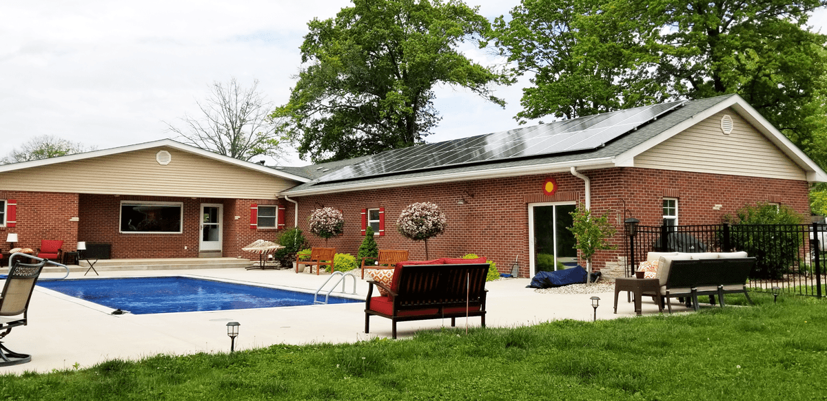 Residential roof mounted solar system near pool in Alton, IL